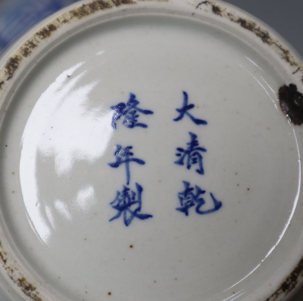 A pair of Chinese porcelain blue and white jars and covers, Qianlong marks but c.1900, 18cm high